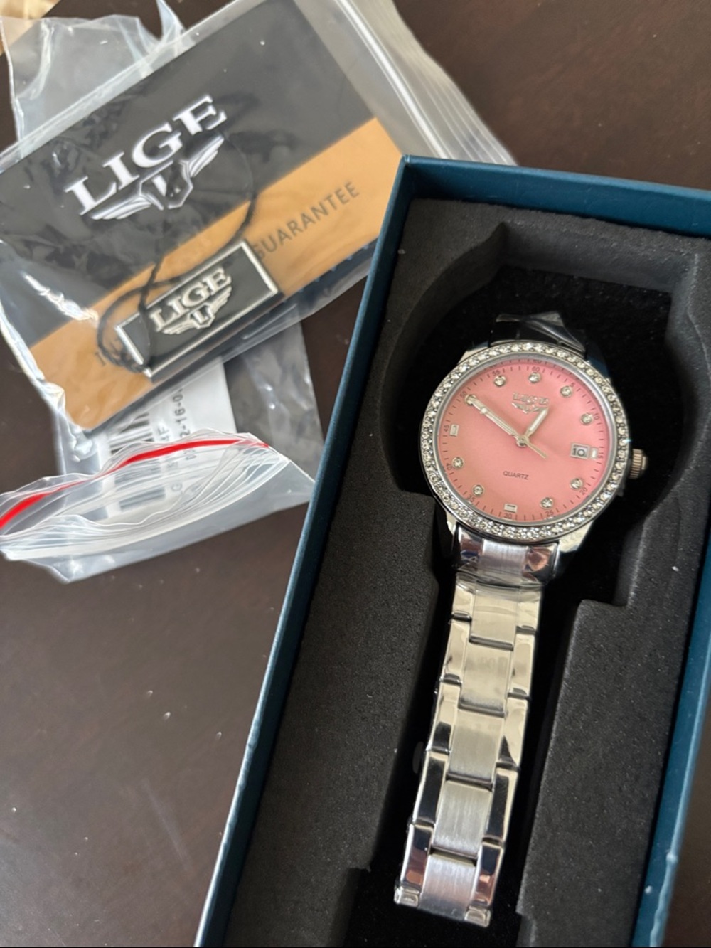 New in box Women's Pink Crystal Accent Stainless Steel Watch